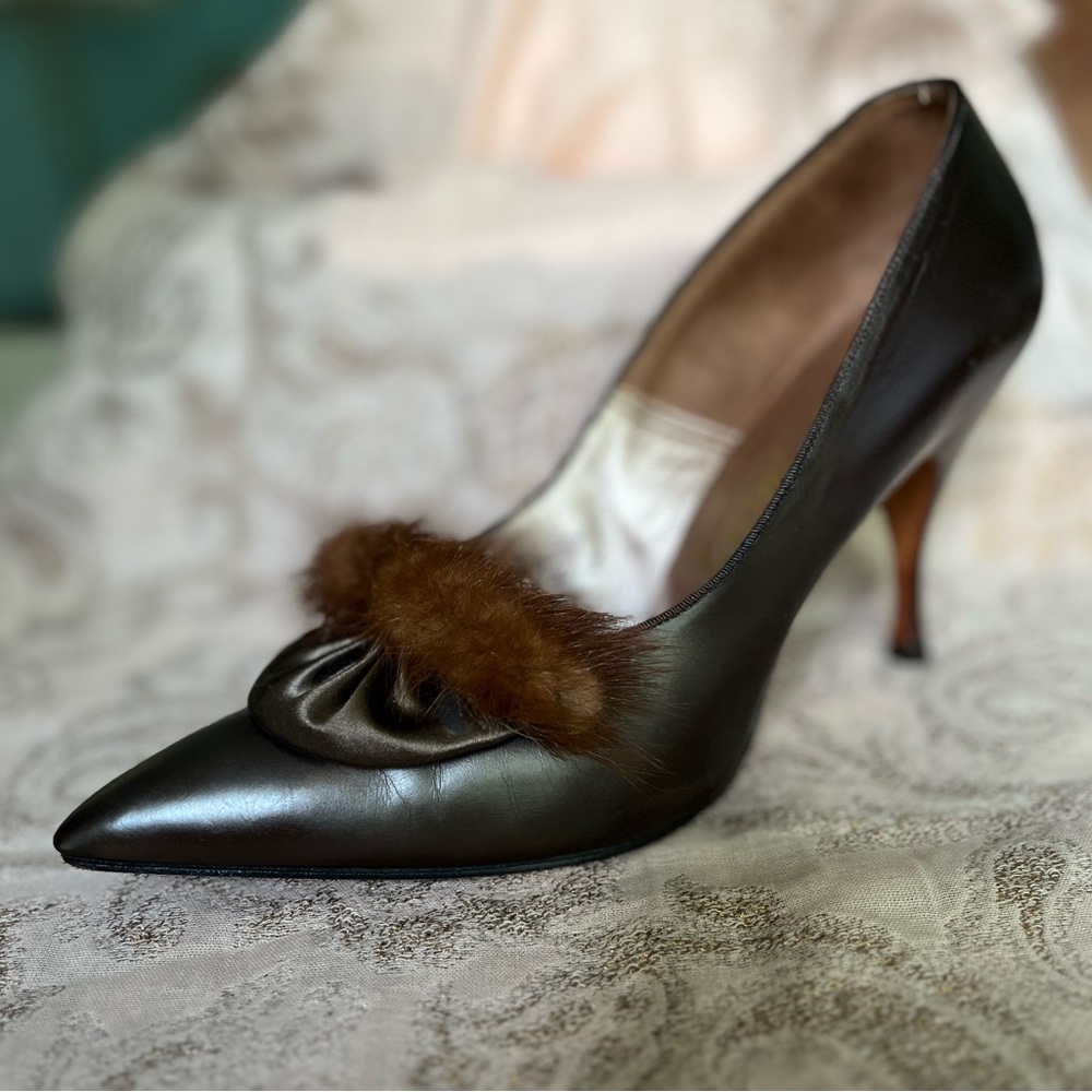 Handcrafted in exquisite leather with satin and mink embellishment. 3.75” heel